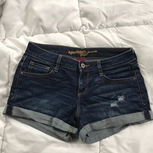 Arizona Jean co mid rise dark wash shorts.